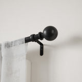 Single Curtain Rods | color: Eco-Friendly Matte Black | size: 72-144" (183-365 cm) | diameter: 1" (2.5 cm) | https://vimeo.com/684798323